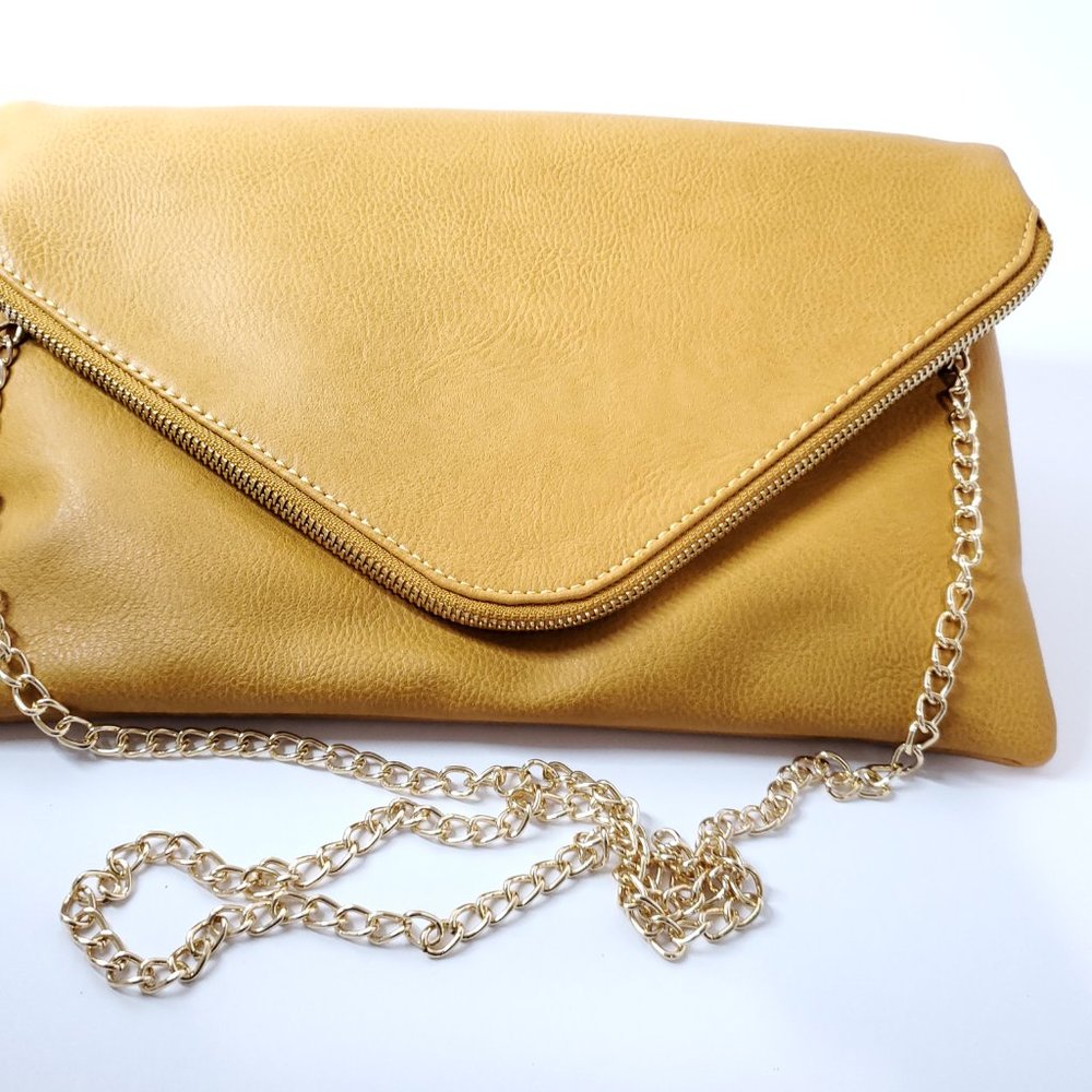 THE HANAA - FOLDING MUSTARD CLUTCH